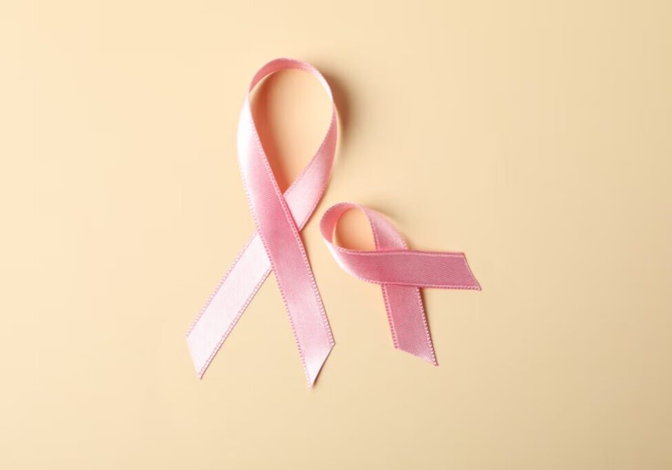 6704f8c81d054d3146e38471_pink-awareness-ribbons-on-color-background-space-2023-11-27-05-11-30-utc (1)